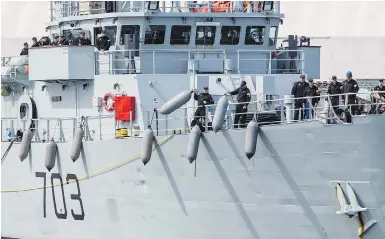  ?? DARREN STONE, TIMES COLONIST ?? HMCS Edmonton prepares to dock at CFB Esquimalt on May 3 after returning from exercises.