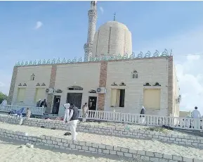  ?? STRINGER / AFP / GETTY IMAGES ?? The Rawda mosque, in North Sinai, Egypt, was the scene of a gun and bombing attack on Friday that killed more than 200 worshipper­s who had gathered for prayers.