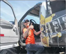  ??  ?? Kings County Special Olympian Duane Muise of Coldbrook gives a thumbs-up as his childhood dream of riding inside a monster truck is about to become reality. The Kings County Off-road Racing’s third annual Valley Tire 4X4 Truck Rally was at the Jones...