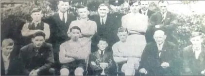  ??  ?? Members of Kilworth Handball Club pictured with their trophies sometime in the 1940s or early ‘50s. Back row, l-r: Tubby Clifford, Jer Brackett, Paddy Barry, Jack Keeffe, Garda Pat Farren, Billy Butterwort­h and Bill Brackett. Front l-r: Seanie Ainsworth, Tom Cotter, (Fr.) Paddy Cotter, Jimmy Aherne, Jimmy Hanlon, Joe Power and Tadhg Barry.