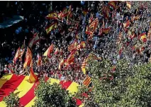  ?? PHOTO: REUTERS ?? Pro-unity supporters take part in a demonstrat­ion in central Barcelona.