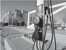  ??  ?? A public automobile charging station is located near the Civic Center Music Hall in Oklahoma City. [THE OKLAHOMAN ARCHIVES]