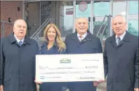  ?? SUBMITTED PHOTO ?? Robert K. Irving, left, president of Cavendish Farms and Wayne McDonald, senior vice president, corporate relations with J.D. Irving, Ltd., right, present a cheque to Brian McMillan, president of Holland College and JoAnn Campbell-Boutilier, executive director of the Holland College Foundation.