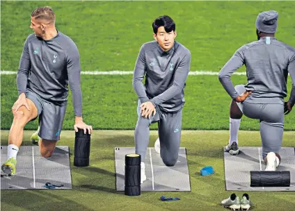  ??  ?? Ready to play: Son Heung-min joins his team-mates in training as Tottenham prepare to face Red Star Belgrade tonight