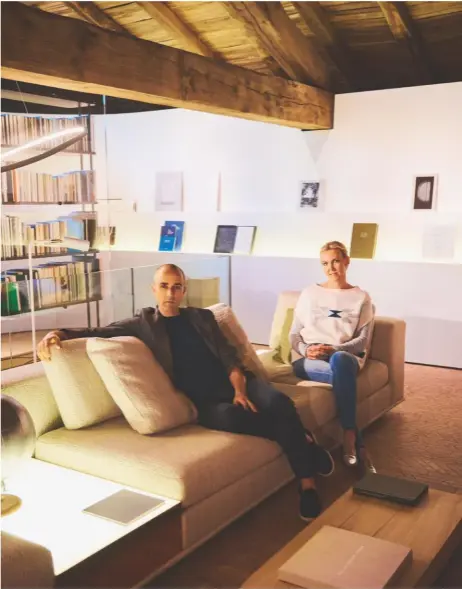  ??  ?? designer raphaël navot with hotelier and art collector garance Primat in one of two new library Spaces at the domaine des Étangs. the ‘Future’ (Pictured) and ‘Past’ libraries occupy mezzanine levels Flanking the estate’s la laiterie exhibition Space