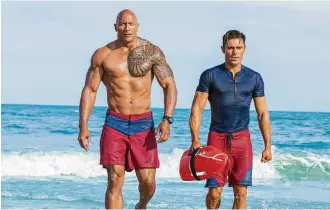  ?? Paramount Pictures ?? Dwayne Johnson, left, and Zac Efron star in a big-screen version of “Baywatch,” in theaters Friday.