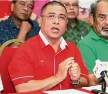  ??  ?? Staying put: Saarani has given his assurance that Perak Umno will continue to back Ahmad Zahid.