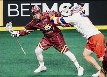  ?? James Franco / Special to the Times Union ?? Albany FireWolves forward Joe Resetarits battles with Halifax defender Graeme Hossack during their game at MVP Arena. Resetarits scored a goal in the first quarter.