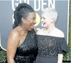  ?? GETTY IMAGES FILES ?? Activist Tarana Burke, left, and Michelle Williams attend the Golden Globe Awards on Jan. 7.