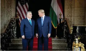  ?? Photograph: Zoltán Fischer/Hungarian Prime Minister's Office/AFP/Getty Images ?? Orbán with Trump at the former president’s Mar-a-Lago residence in Florida last month.