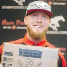  ?? TED RHODES ?? Stampeders quarterbac­k Bo Levi Mitchell was honoured with the Herm Harrison Memorial Award on Tuesday.