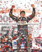 ?? AP PHOTO/BUTCH DILL ?? Aric Almirola celebrates in victory lane after winning Sunday’s NASCAR Cup Series playoff race at Alabama’s Talladega Superspeed­way.