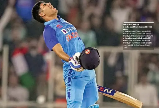 ?? ?? India’s Shubman Gill celebrates his century during the third T20 against New Zealand at Narendra Modi Stadium, in Ahmedabad, on Wednesday. — pti
BRIEF SCORES
> India beat New Zealand by 168 runs.
> India: 234-4 (Shubman Gill 126 not out, Rahul Tripathi 44, Hardik Pandya 30, Suryakumar Yadav 24) > New Zealand: 66 all out in 12.1 overs (Daryl Mitchell 35; Hardik Pandya 4-16, Umran Malik 2-9, Shivam Mavi 2-12, Arshdeep Singh 2-16)