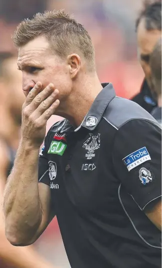  ??  ?? Magpies coach Nathan Buckley during the loss to Essendon on Tuesday. Picture: AAP IMAGE