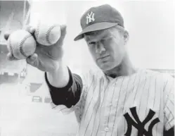  ?? ASSOCIATED PRESS FILE PHOTO ?? Yankees pitcher Jim Bouton prepares to pitch before a 1964 World Series game. He shocked the conservati­ve baseball world with the tell-all book Ball Four. He died Wednesday.