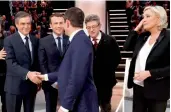  ?? — AP ?? (Left to right) Presidenti­al candidates Francois Fillon, Emmanuel Macron, Benoit Hamon, Jean-Luc Melenchon, and Marine Le Pen in Paris on Monday.