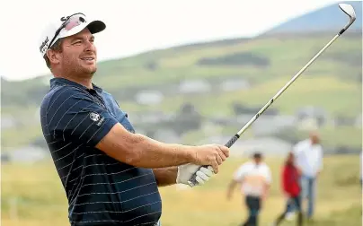  ?? GETTY IMAGES ?? Kiwi golfer Ryan Fox plays his second shot on the 11th hole during the second round of the Irish Open in Donegal last week. He came second in the tournament.