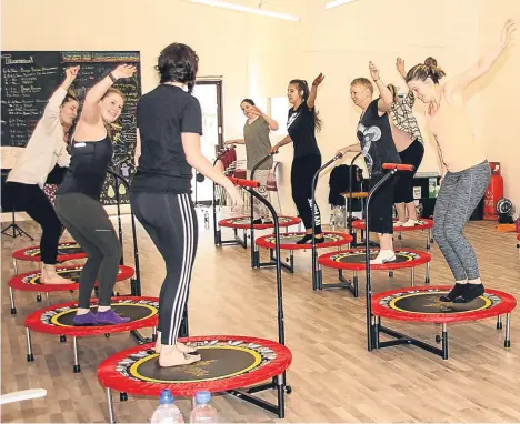  ??  ?? A “BOUNCEATHO­N” was held at Jessie Ann Dance and Fitness in Arbroath to raise funds for the local community.
At the 12-hour event in Millgate, Jessie (left) challenged 16 members of her Boogie Bounce mini-trampoline class to dance the day away in...