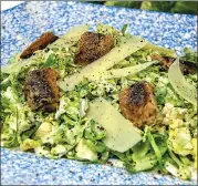  ?? Associated Press photo ?? This photo shows Brussels sprouts Caesar salad with sardine croutons in Bethesda, Md.