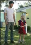  ?? WILSON WEBB/FOX SEARCHLIGH­T PICTURES VIA AP ?? Chris Evans, left, and McKenna Grace appear in a scene from, “Gifted.”