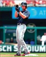  ?? JEFF ROBERSON / The Associated Press ?? Atlanta’s Charlie Culberson reacts at second base after a double in the second inning to give the Braves a 1-0 lead on Sunday.