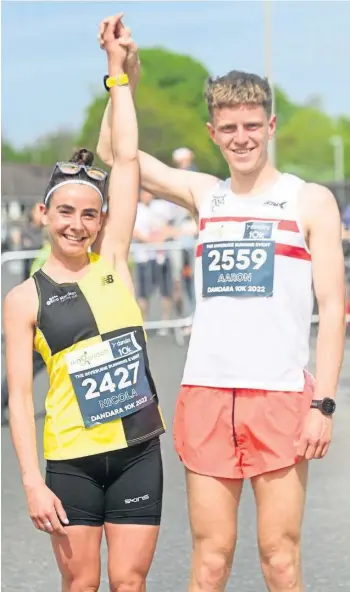  ?? ?? CELEBRATIN­G VICTORY: Nicola MacDonald and Aaron Odentz came home first female and male in the Run Garioch 10k on Sunday. The event made a welcome return to the running calendar after a three-year break due to the pandemic. Pictures by Chris Sumner.