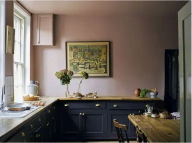  ??  ?? LEFT In this period kitchen, Paean Black looks sleek teamed with Sulking Room Pink, from £26 for 750ml, both Farrow &amp; Ball.