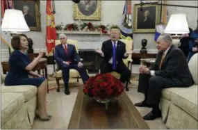  ?? AP PHOTO/EVAN VUCCI ?? In this Dec. 11 photo, President Donald Trump and Vice President Mike Pence meet with Senate Minority Leader Chuck Schumer, D-N.Y., and House Minority Leader Nancy Pelosi, D-Calif., in the Oval Office of the White House in Washington.