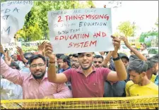  ??  ?? CBSE students protest over the alleged paper leak, at Jantar Mantar in New Delhi, on Thursday. The Central Board of Secondary Education has scrapped both Class 12 economics exam and Class 10 mathematic­s exam after the reports that students had been...