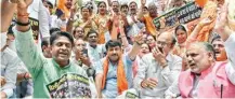  ?? PIC/PTI ?? Delhi BJP president Manoj Tiwari with party workers during Wednesday’s protest