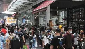  ?? ?? are you prepared to step into a ‘normal’ crowd at Kuala Lumpur’s Bukit Bintang area? — yap CHEE HONG/THE Star