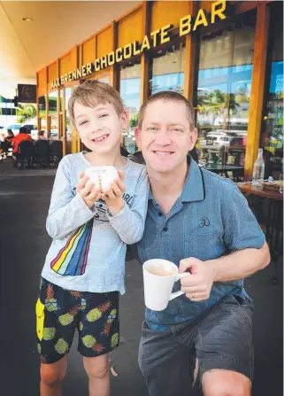  ?? REGULARS: Daniel Rojo with son Dominic, 8, at Max Brenner. Picture: SCOTT RADFORD- CHISHOLM ??