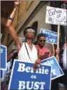  ?? CHEN WEIHUA / CHINA DAILY ?? YaNe Ndgo of Revolt Against Plutocracy leads a protest on Monday outside Philadelph­ia City Hall in support of Bernie Sanders. Monday was the first day of the four-day 2016 Democratic National Convention at the city’s Wells Fargo Center.