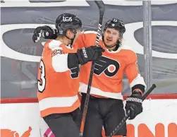  ?? ERIC HARTLINE/USA TODAY SPORTS ?? Flyers right wing Travis Konecny (11) celebrates his goal with Oskar Lindblom (23) against the Sabres on Tuesday.