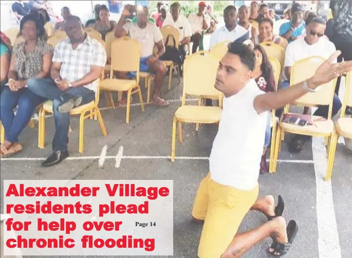  ??  ?? Alexander Village resident, Navin on his knees appealing for help yesterday.