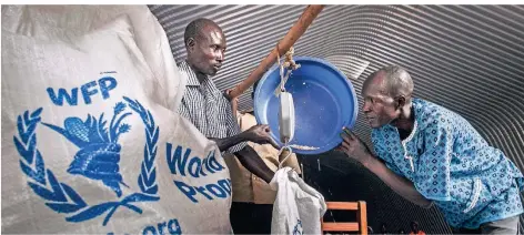  ?? FOTO: RICK D’ELIA/IMAGO IMAGES ?? Verteilung von Mais durch das Welternähr­ungsprogra­mm 2015 im Südsudan.