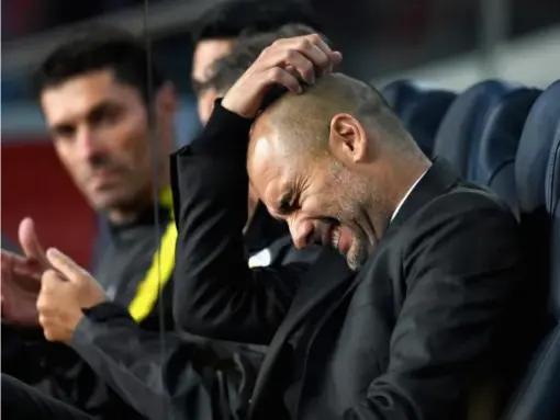  ?? (Getty) ?? Guardiola suffered a chastening night at the Nou Camp on Wednesday