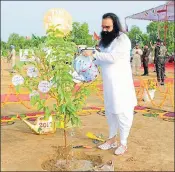  ?? HT FILE ?? Dera Sacha Sauda chief Gurmeet Ram Rahim Singh during a plantation drive at Sirsa.