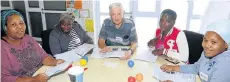  ?? Picture: BRIAN WITBOOI ?? TRAINING FOR EDUCATORS: Waldo Schumann, centre, helps preschool teachers, from left, Nomvuzo Ndubela, Nandipha Kleinbooi, Zizipho Ngxumza and Andiswa Nomachiwa in the Walmer township