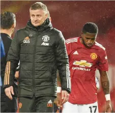  ?? — AFP photo ?? Solskjaer (le ) gestures on the pitch at the end of the English Premier League match against Chelsea at Old Trafford in Manchester, north west England in this Oct 24 file photo.