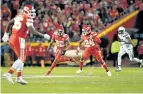  ?? PETER AIKEN/GETTY IMAGES ?? Marcus Peters, of the Kansas City Chiefs, returns an intercepte­d a pass during KC’s game against the Los Angeles Chargers, at Arrowhead Stadium on Dec. 16, in Kansas City.