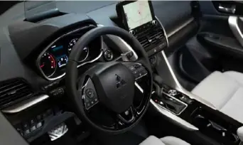  ?? John Murphy Photograph­y ?? The interior of the 2022 Mitsubishi Eclipse Cross gets a much-needed makeover, and it now offers a far better stereo than Mitsubishi­s usually do.