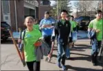  ?? DIGITAL FIRST MEDIA FILE PHOTO ?? Volunteers start out carrying various garden tools as part of least year’s “Rock the Block” cleanup effort in Pottstown.