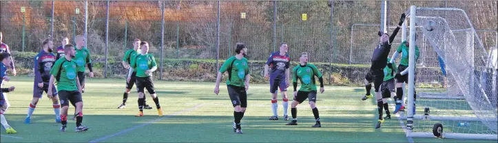  ?? Match report and photos: Derek Black ?? Craig MacEwan, far left, gets on the end of a Ross Maitland corner to open the scoring for Saints last Saturday.