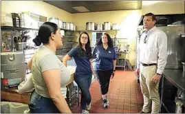  ?? COURTESY OF THE OPEN DOOR NETWORK ?? Rep. David Valadao hears about the services The Open Door Network offers to women and children who are experienci­ng homelessne­ss.