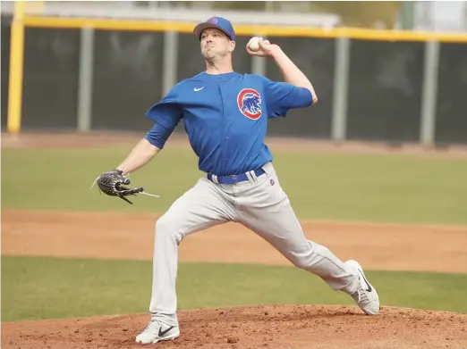  ?? JOHN ANTONOFF/SUN-TIMES ?? Left-hander Drew Smyly, one of the Cubs’ fastest workers on the mound, had some issues adjusting to the pitch clock Tuesday.