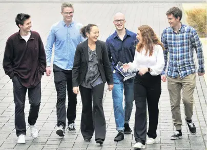  ?? PHOTO: CHRISTINE O’CONNOR ?? Comparing apples with apples . . . This University of Otago team won the 2020 Chartered Financial Analysts Institute Research Challenge from left: Sam Gouverneur, Luke Gordon, Dr Helen Roberts (coach), Ben Taylor, Rosie Jerram, Lachie McLean.