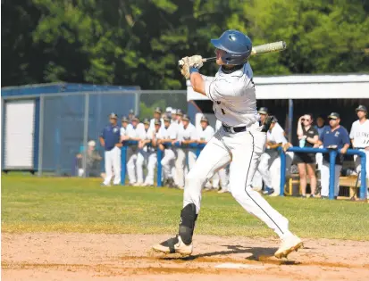  ?? PAUL W. GILLESPIE/CAPITAL GAZETTE ?? Severna Park senior shortstop Jackson Merrill hits a three-run home run in the second inning during Saturday’s 4A East Region II championsh­ip game against Leonardtow­n. The Falcons won 6-0 to advance to the state quarterfin­als.