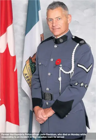  ??  ?? Former Northumbri­a Police officer John Davidson, who died on Monday while responding to an incident in the Canadian town he served