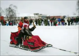  ?? THE ASSOCIATED PRESS ?? In this file photo, defending Iditarod champion Mitch Seavey rounds a turn during the ceremonial start of the Iditarod Trail Sled Dog Race in Anchorage, Alaska.